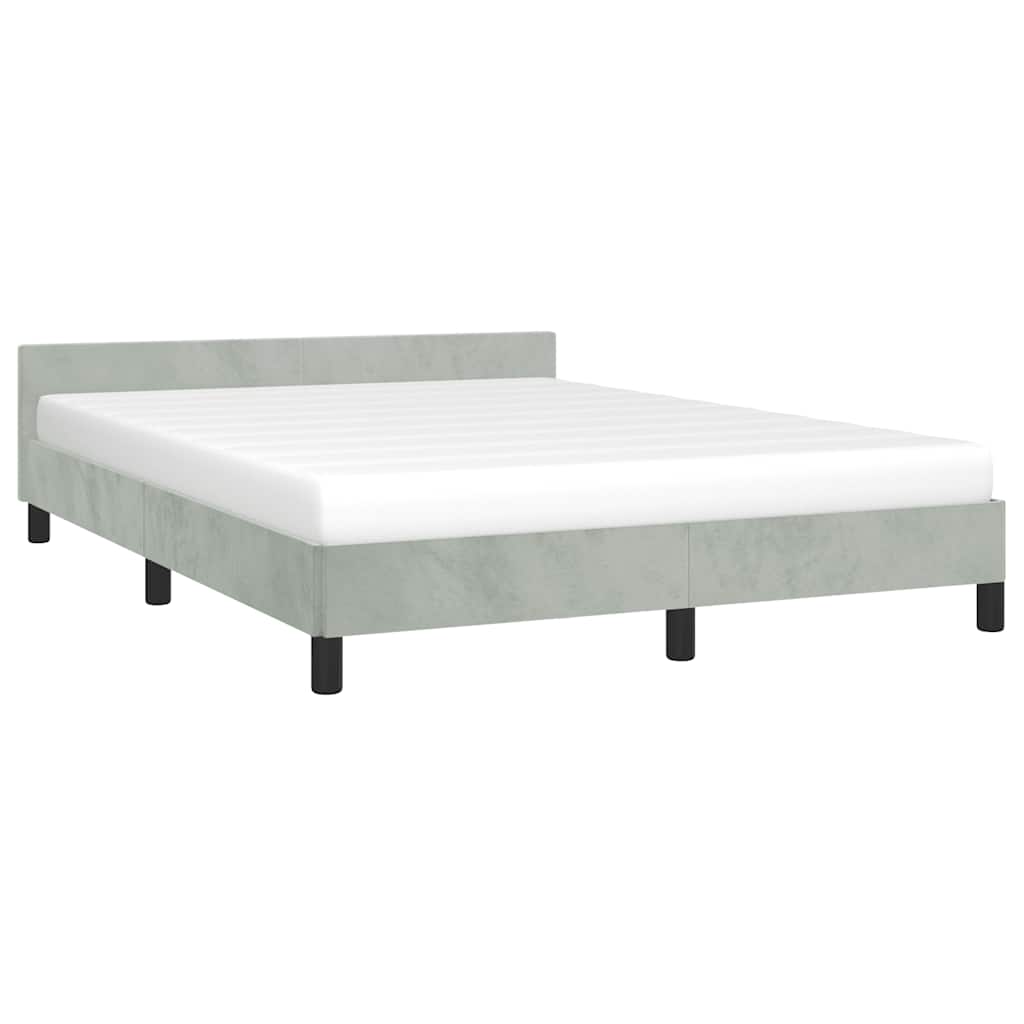 Light grey upholstered bed frame with a plain headboard and black legs