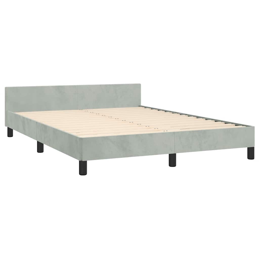 Light grey upholstered platform bed frame with black legs