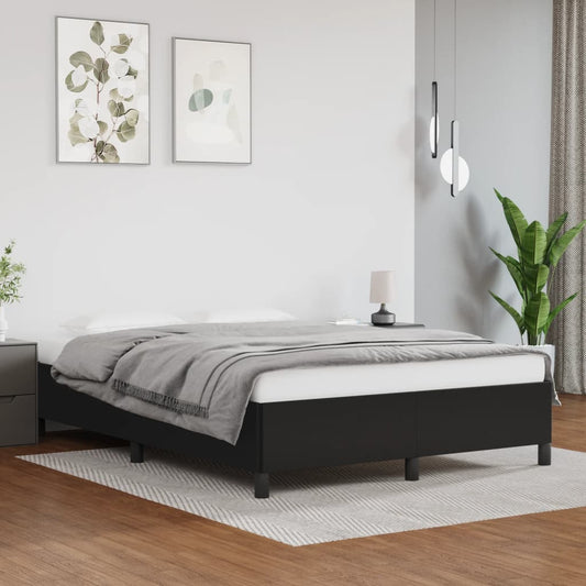Platform bed frame with dark grey upholstery and clean lines