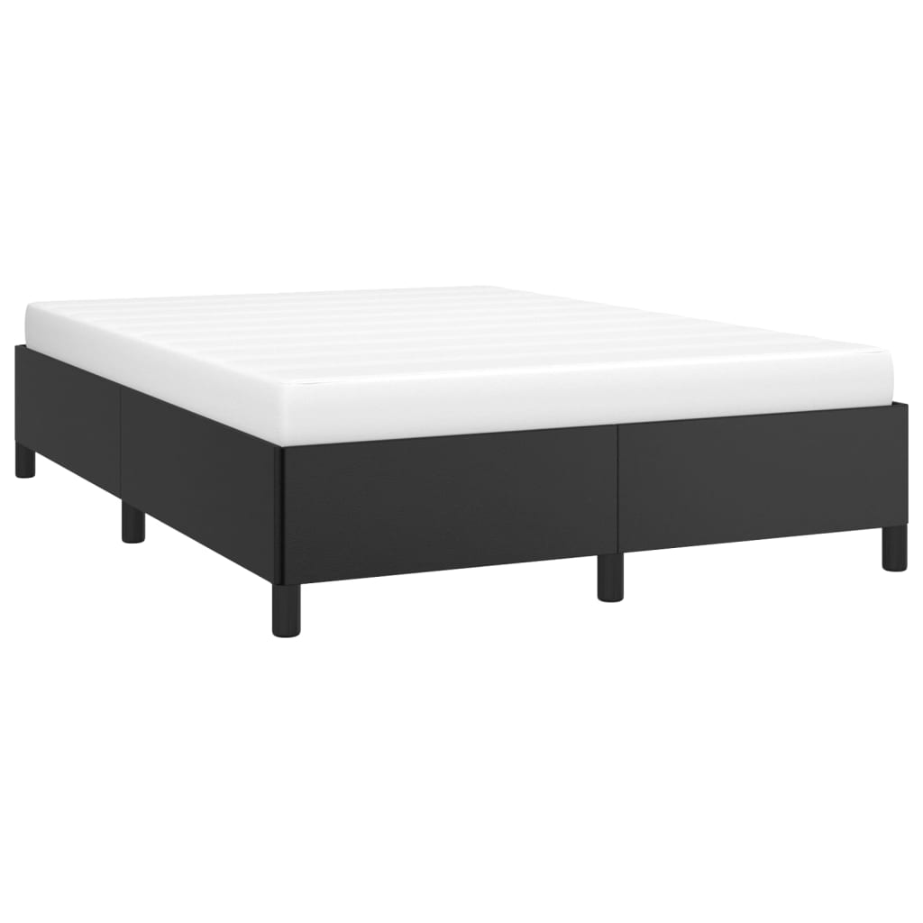 Modern black upholstered bed frame with a white mattress