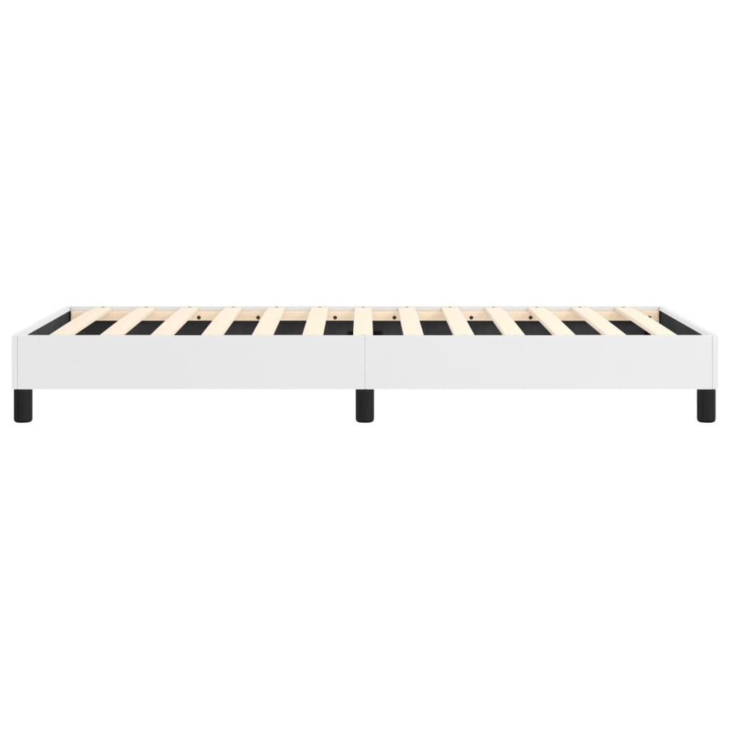 White wooden platform bed frame with slatted support