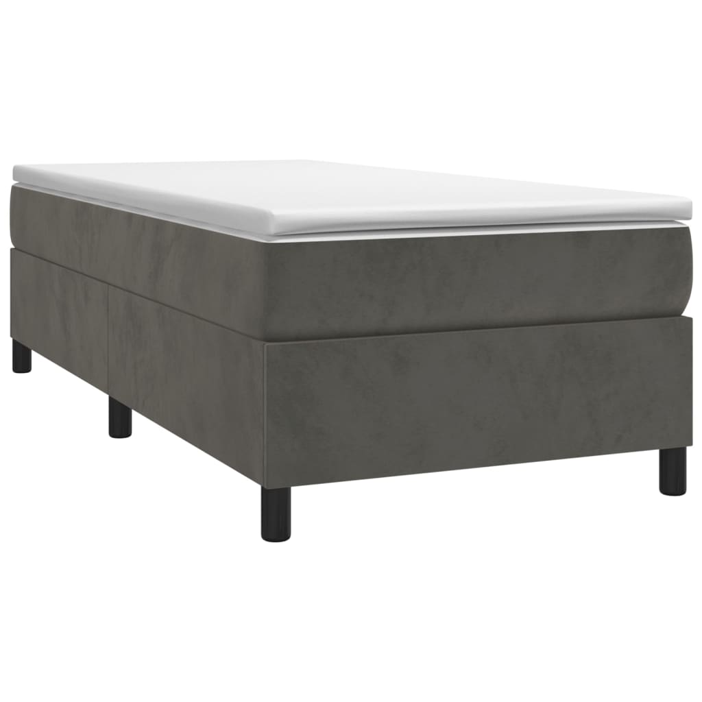 Dark grey upholstered divan bed frame with white mattress