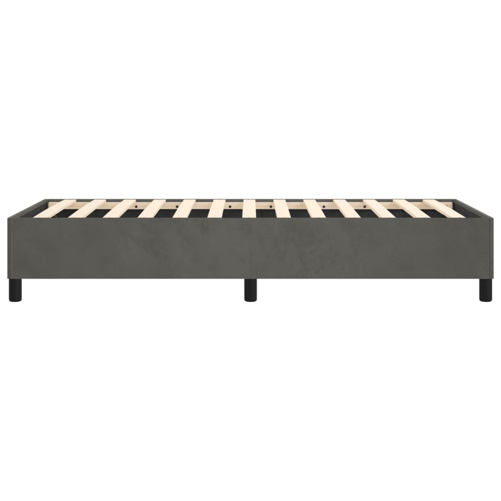 Gray velvet upholstered bed frame with wooden slats