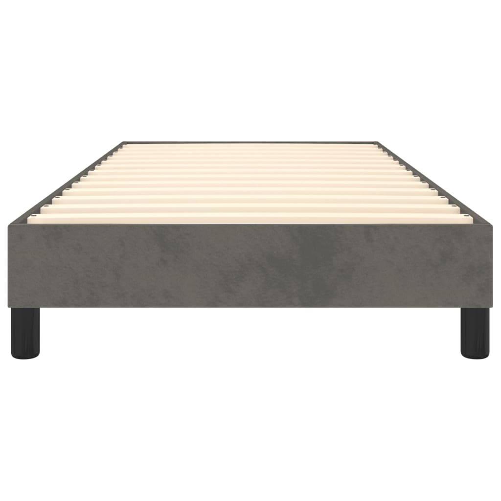 Dark grey upholstered bed frame with wooden slats and black legs