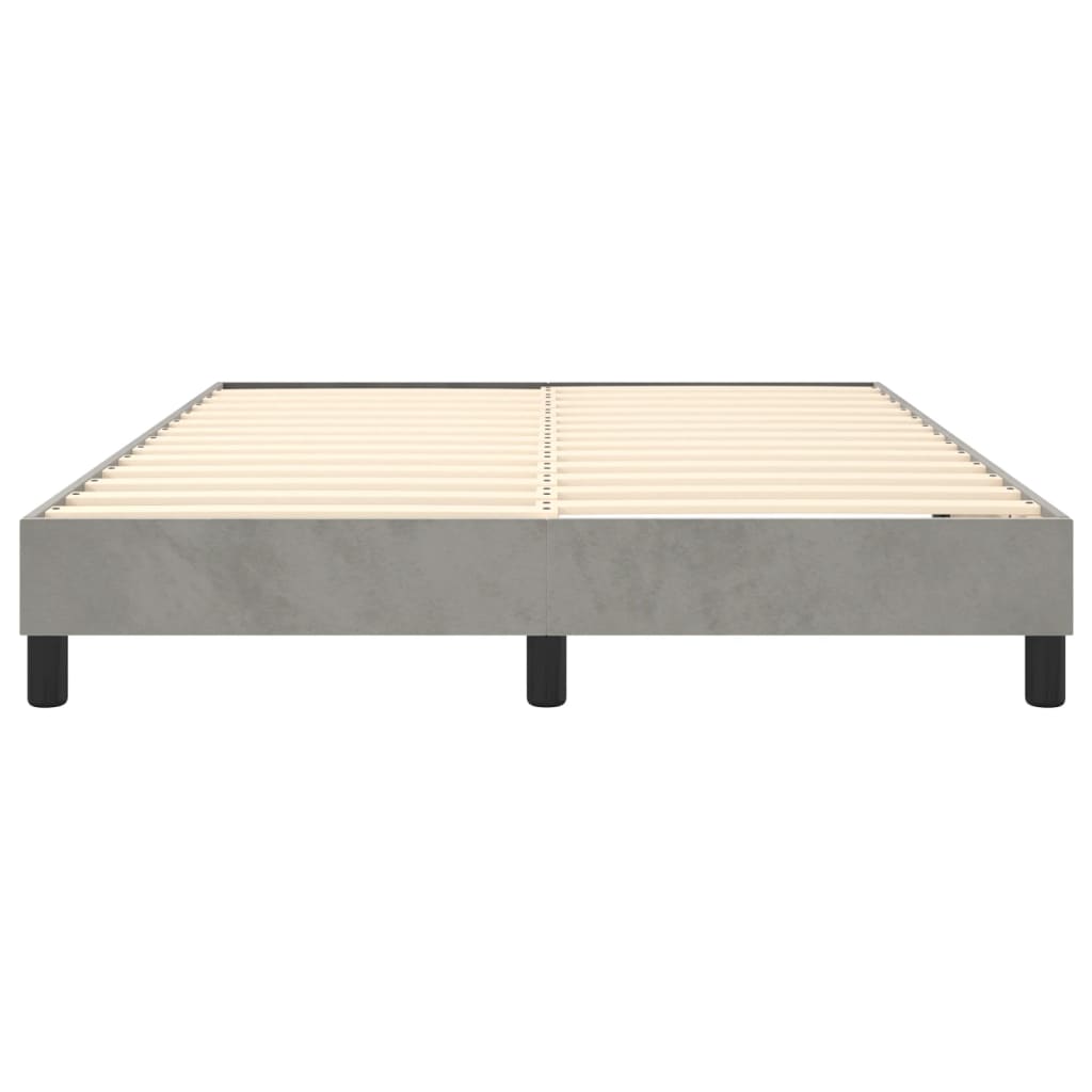Modern grey platform bed frame with wooden slats and black legs