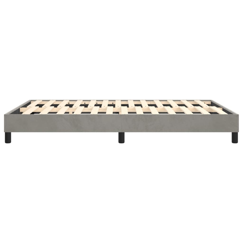 Gray upholstered queen bed frame with wooden slats