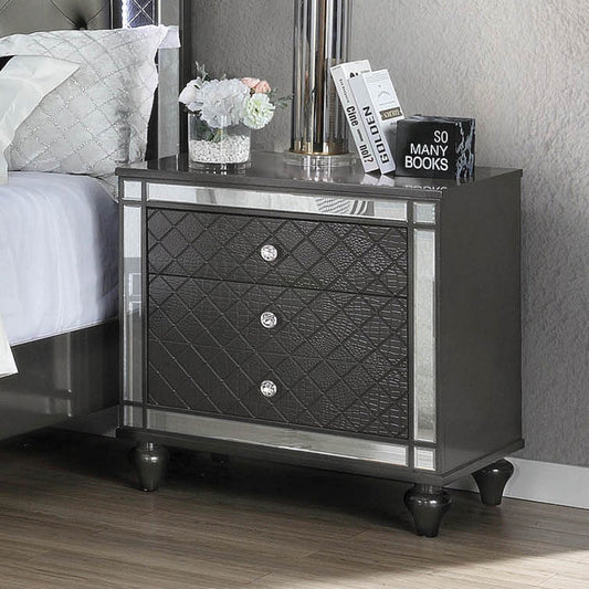 Gray mirrored nightstand with quilted diamondpattern drawers and crystal knobs