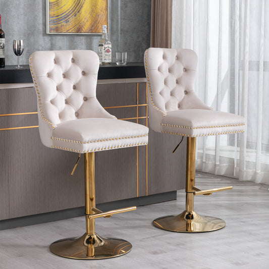 Cream velvet tufted bar stool with gold base and nailhead trim