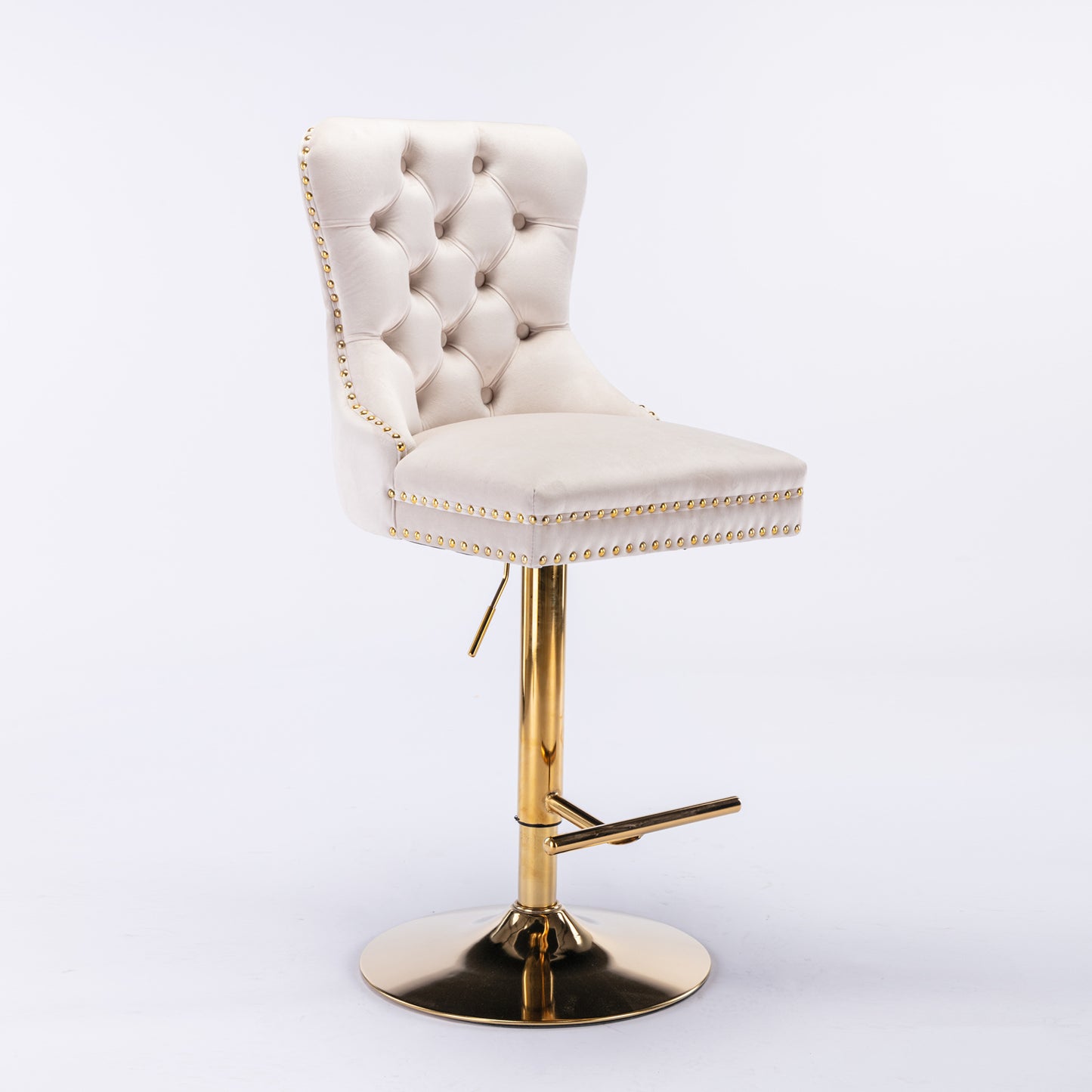 Elegant cream velvet bar stool with tufted back and gold stud detailing