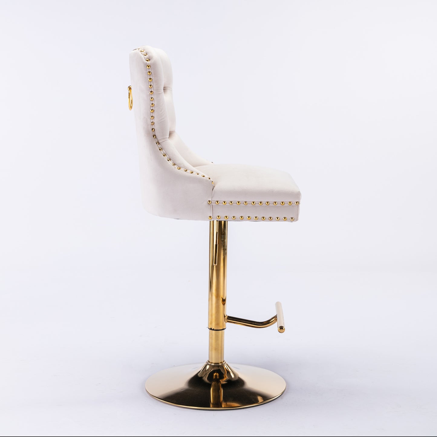 Cream velvet bar stool with gold studs and a gold ring detail on the back