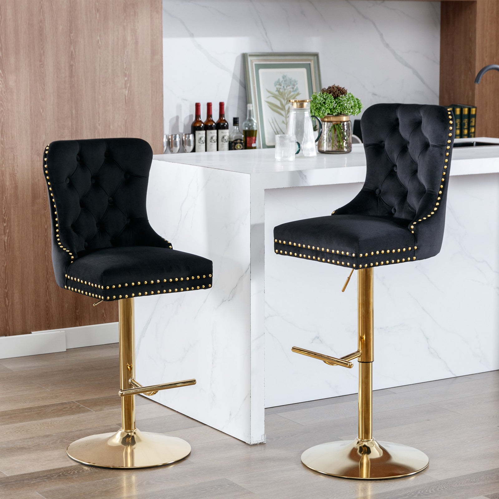 Black velvet tufted bar stool with gold trim and adjustable height