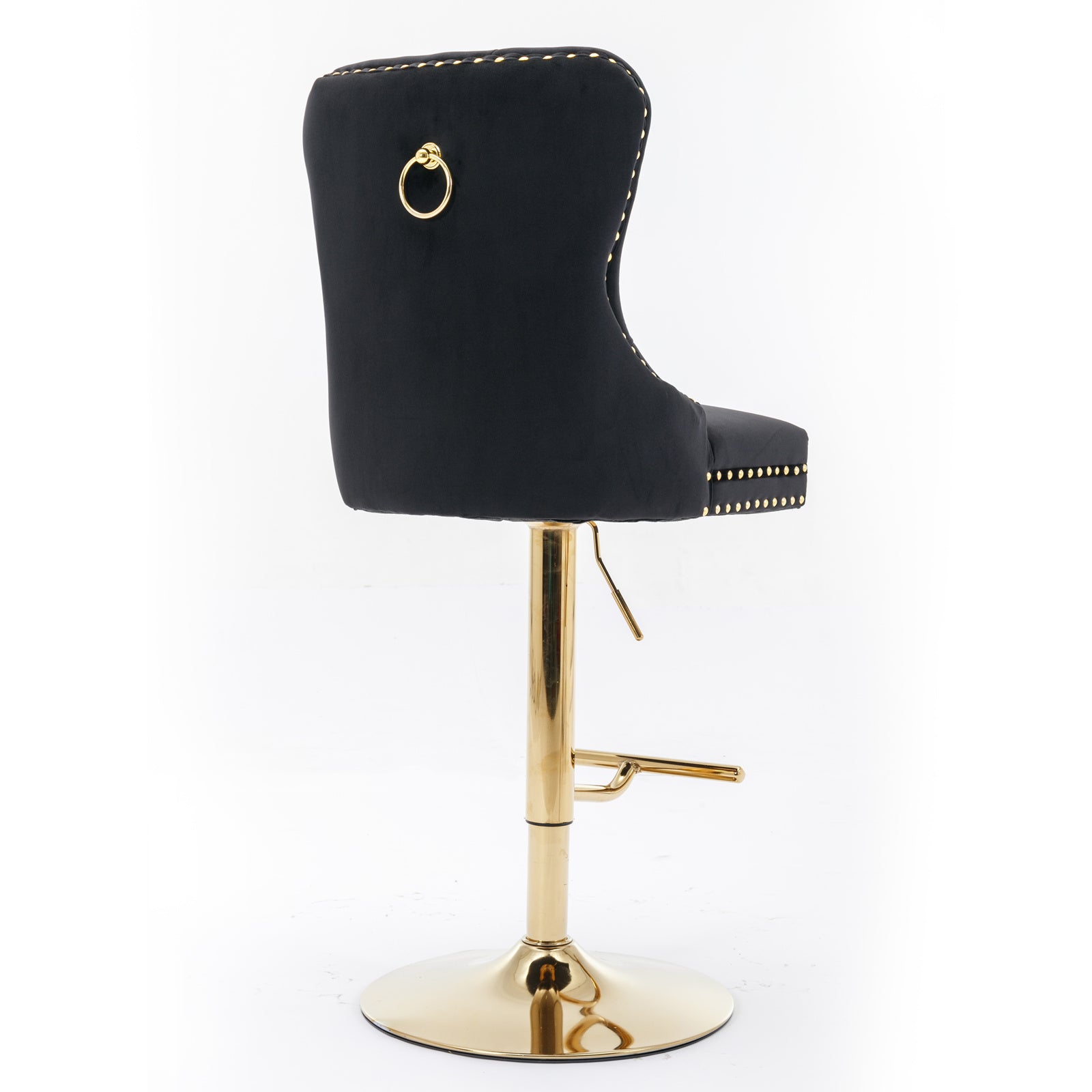 Black velvet bar stool with gold ring detail and studded trim