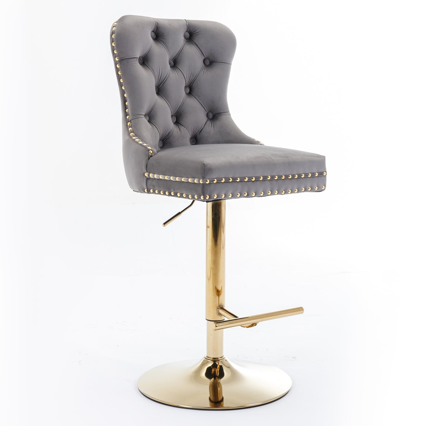 Gray velvet tufted bar stool with gold nailhead trim and polished gold base