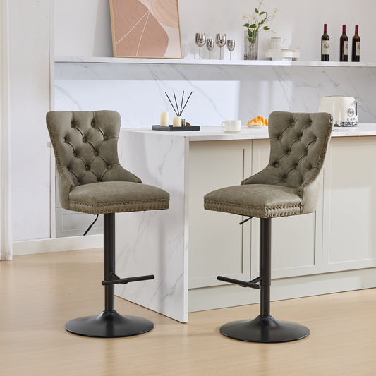 Tufted grey leatherette bar stool with studded trim and adjustable height