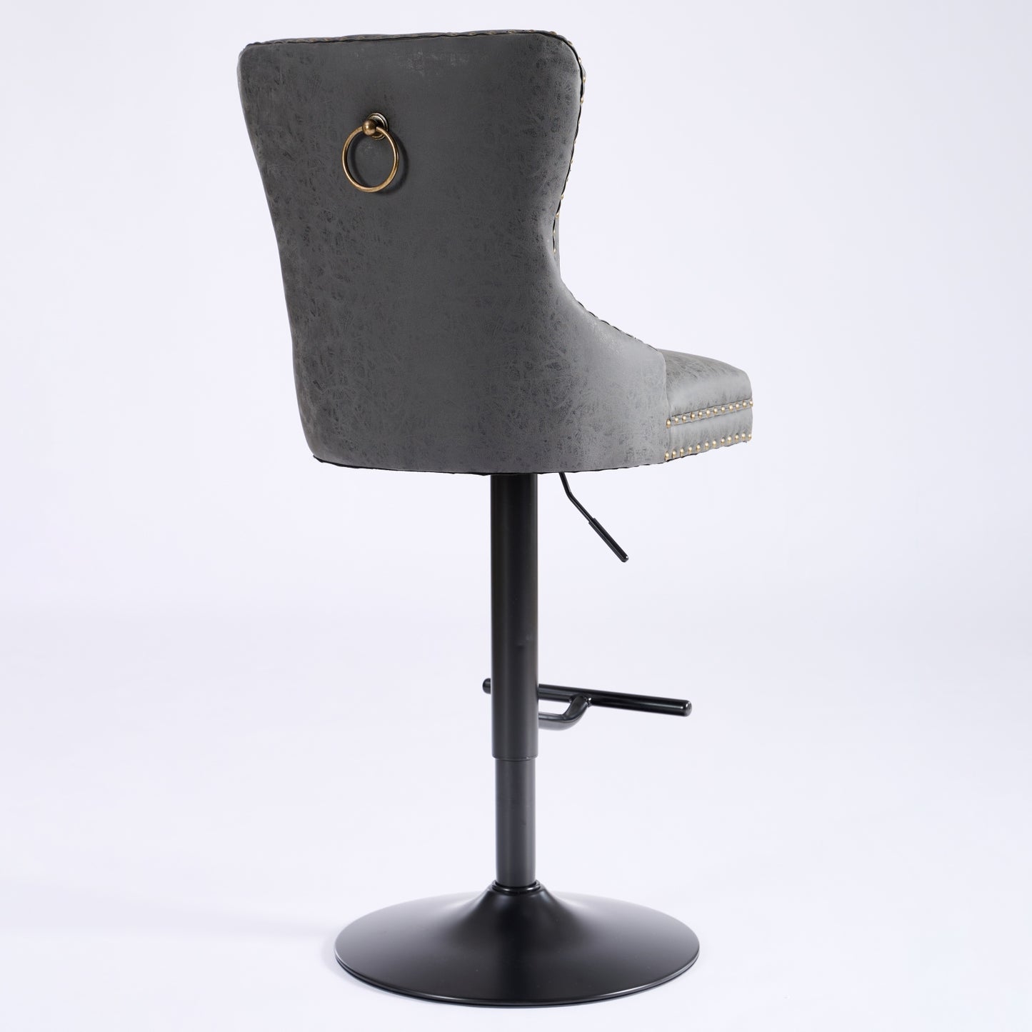 Grey velvet bar stool with gold ring accent and brass nailhead trim