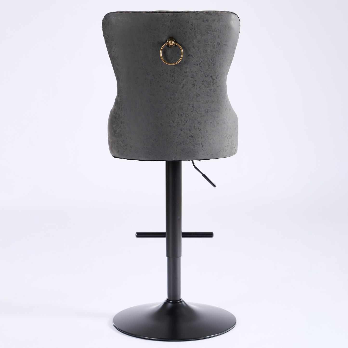 Grey upholstered bar stool with gold ring detail and adjustable height