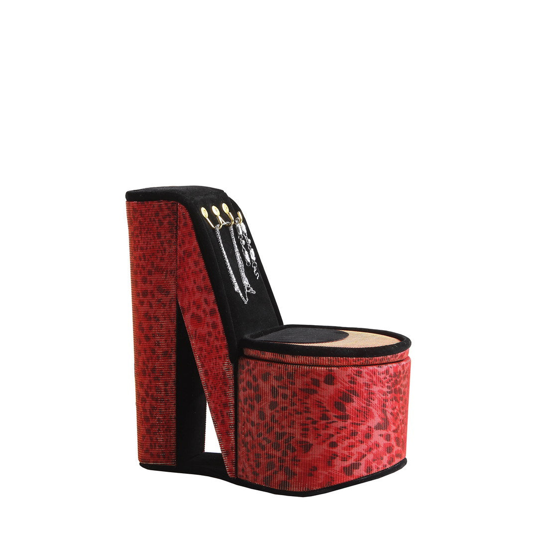 Red highheeled shoe jewelry organizer with black velvet lining and hanging necklaces