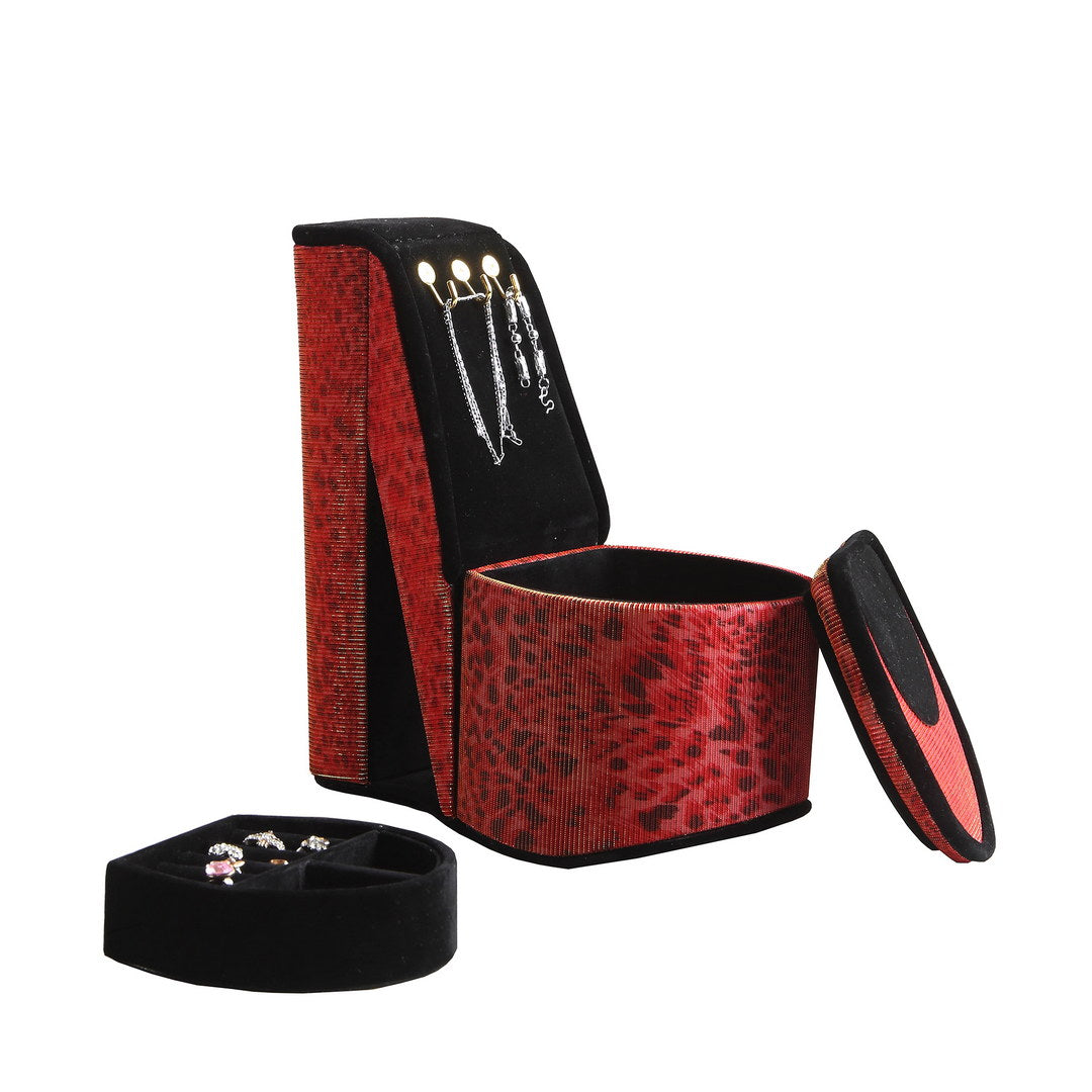 Red leopard print jewelry box with hanging earrings and ring tray