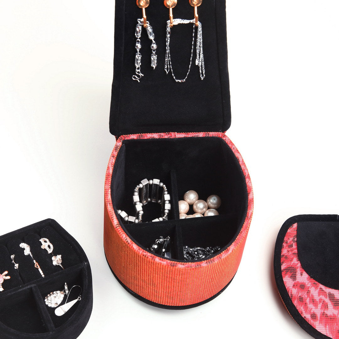 Elegant silver bracelet with geometric beads in an open jewelry box