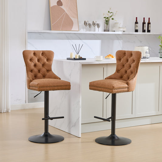 Tufted brown faux leather bar stool with nailhead trim and black metal base