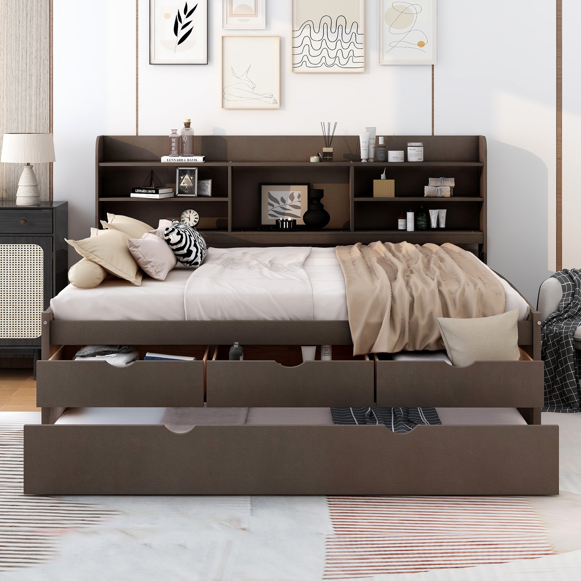 Brown upholstered daybed with multiple storage drawers and integrated headboard shelving