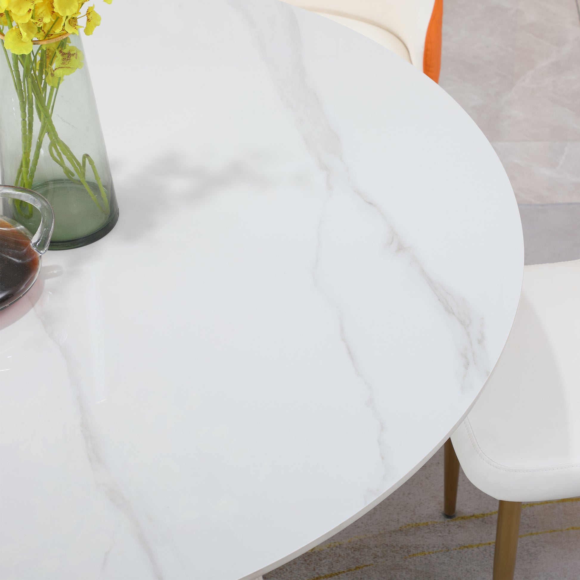 White marble dining table with gold legs