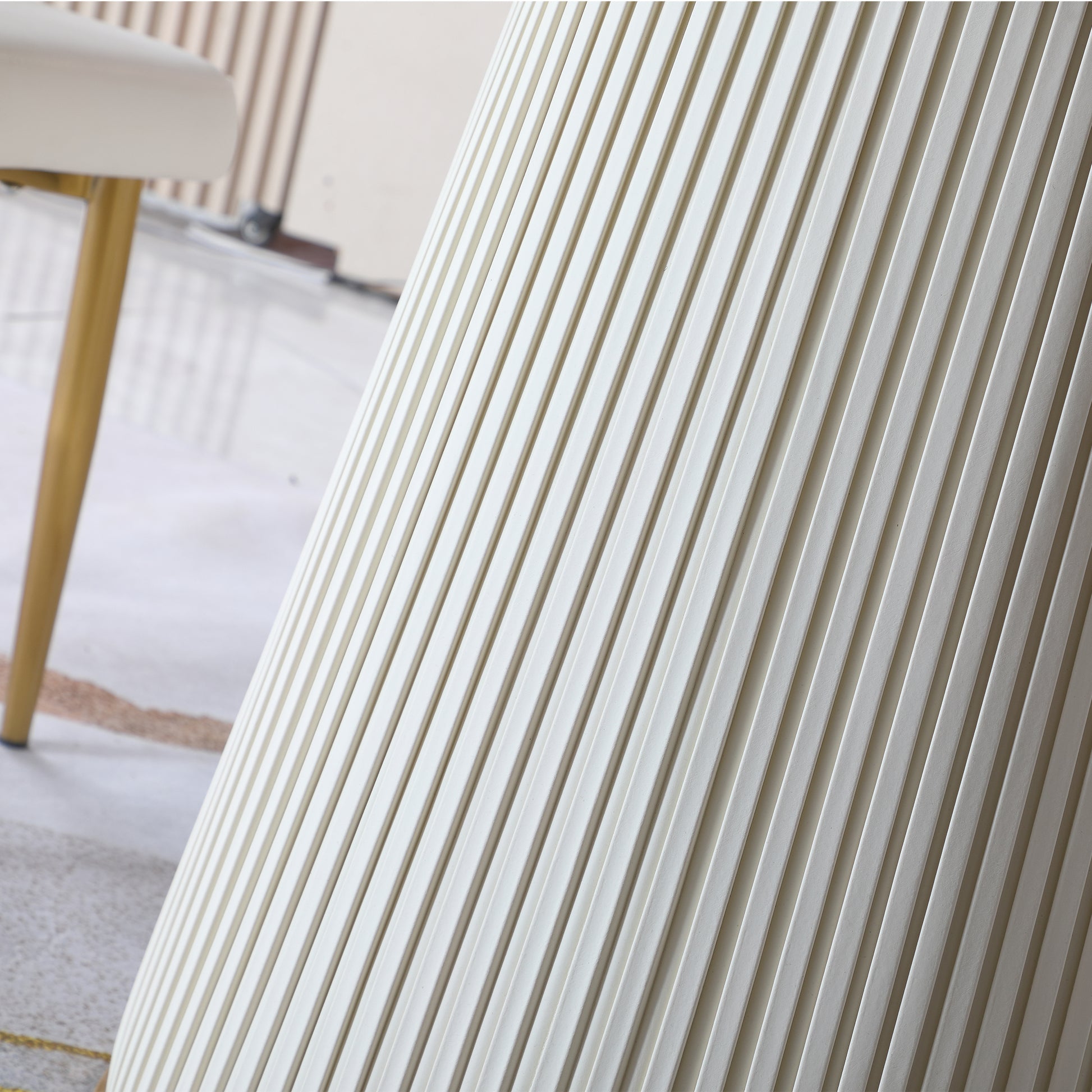 Cream fluted cylindrical accent table detail
