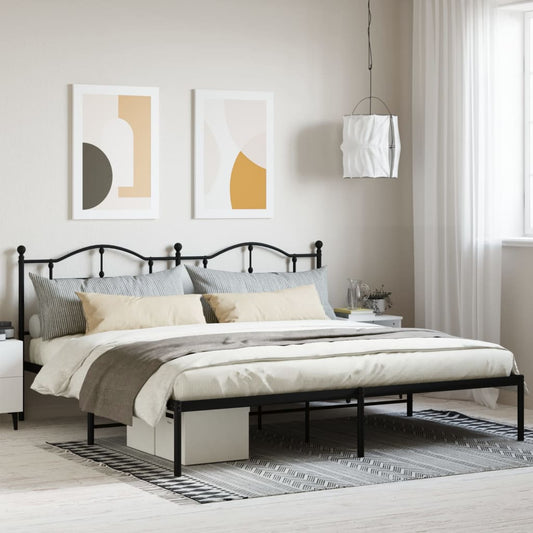 Ornate black metal queen bed frame with classic scrollwork headboard