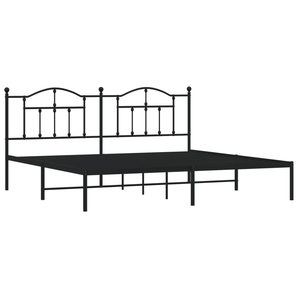 Black metal bed frame with decorative arched headboard and footboard