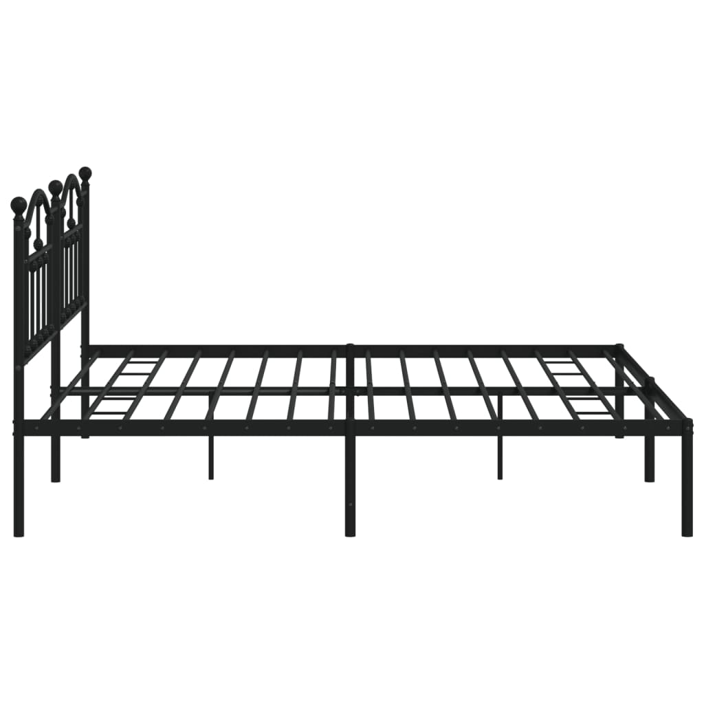 Elegant black metal bed frame with ornate headboard and mattress