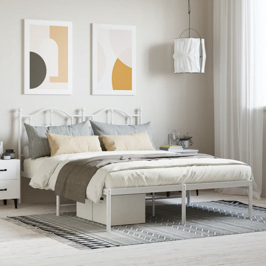 White metal twin bed frame with arched headboard and footboard