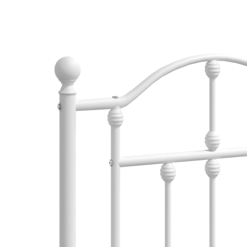 White metal twin bed frame with ornamental headboard