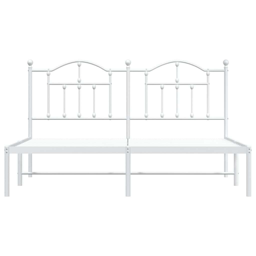 White metal bed frame with arched headboard and footboard perfect for a minimalist bedroom