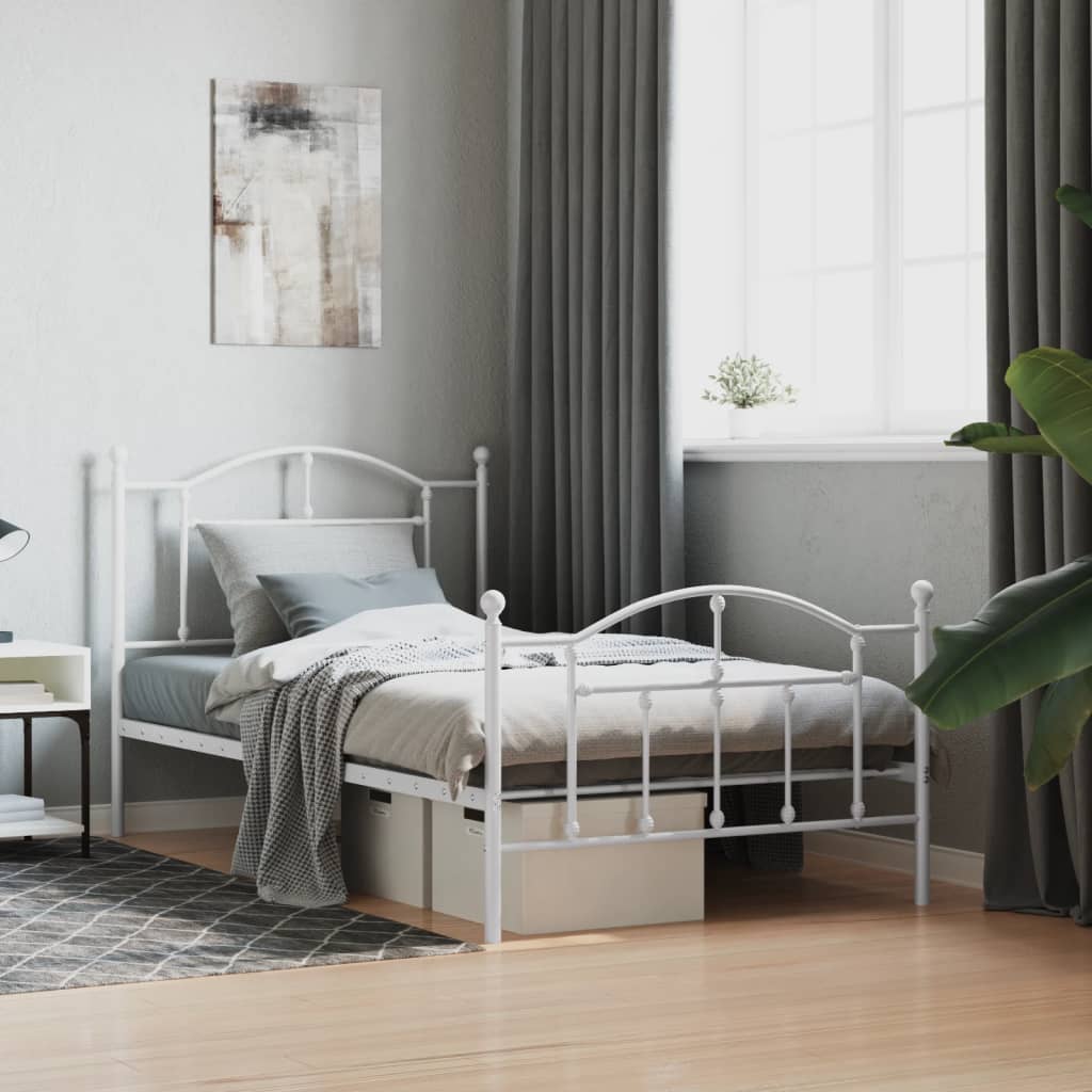 Classic white metal bed frame with ornate headboard and footboard