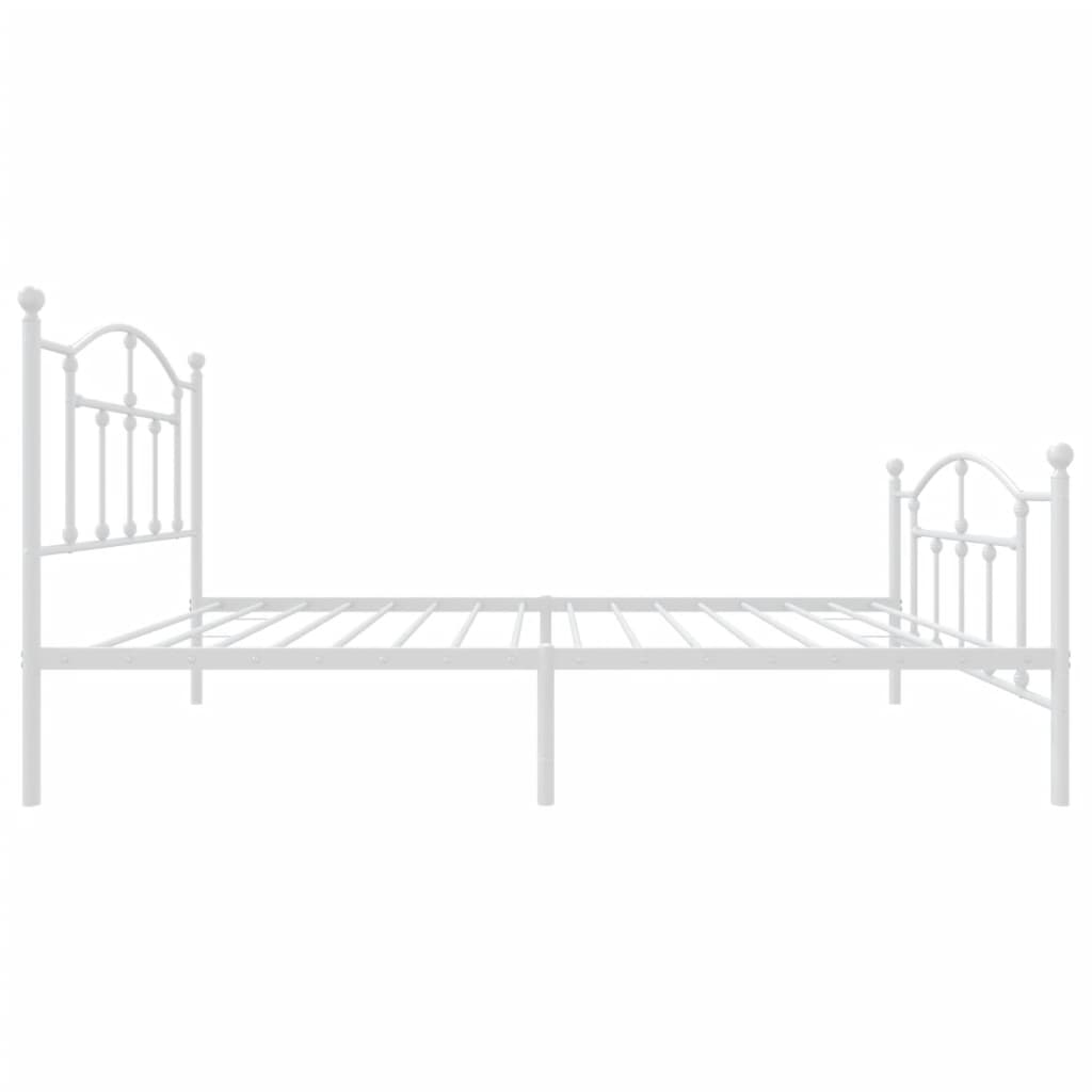 White metal bed frame with mattress featuring a curved headboard and footboard with finial details