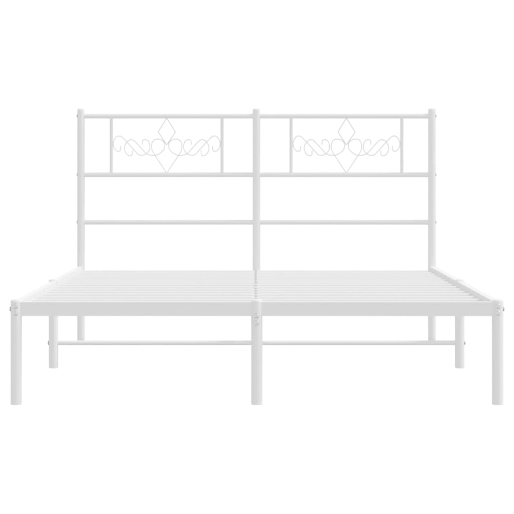 Modern white metal bed frame with decorative headboard and grey bedding