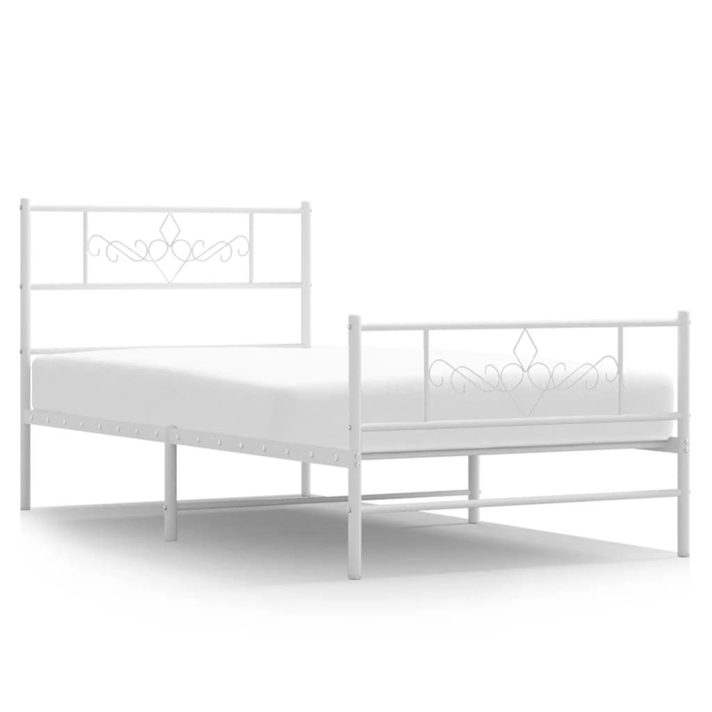 Black metal twin bed frame with ornate headboard and footboard