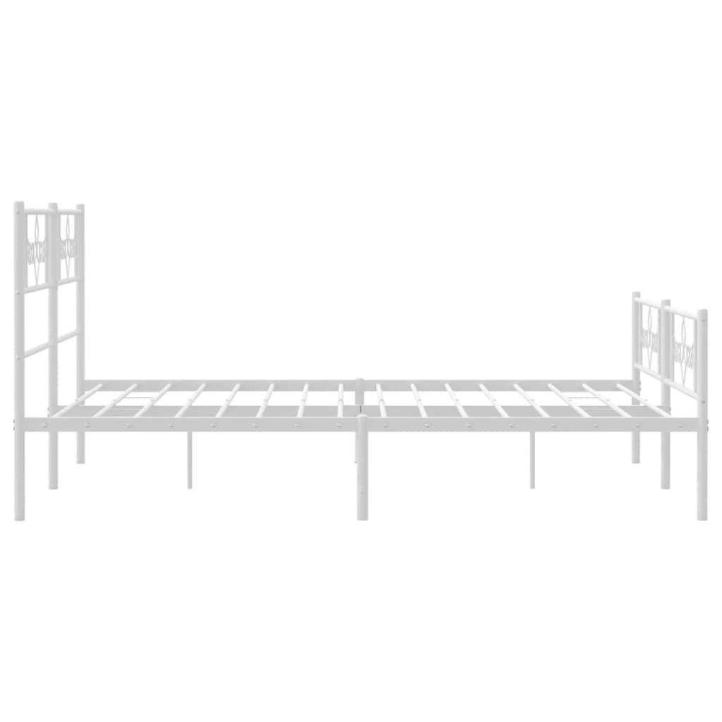 White metal twin bed frame with decorative scrollwork headboard and footboard