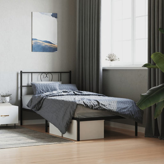 Black metal twin bed frame with heartshaped headboard detail