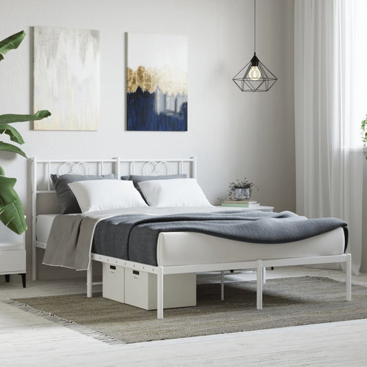 White metal twin bed frame with heart detailing on headboard