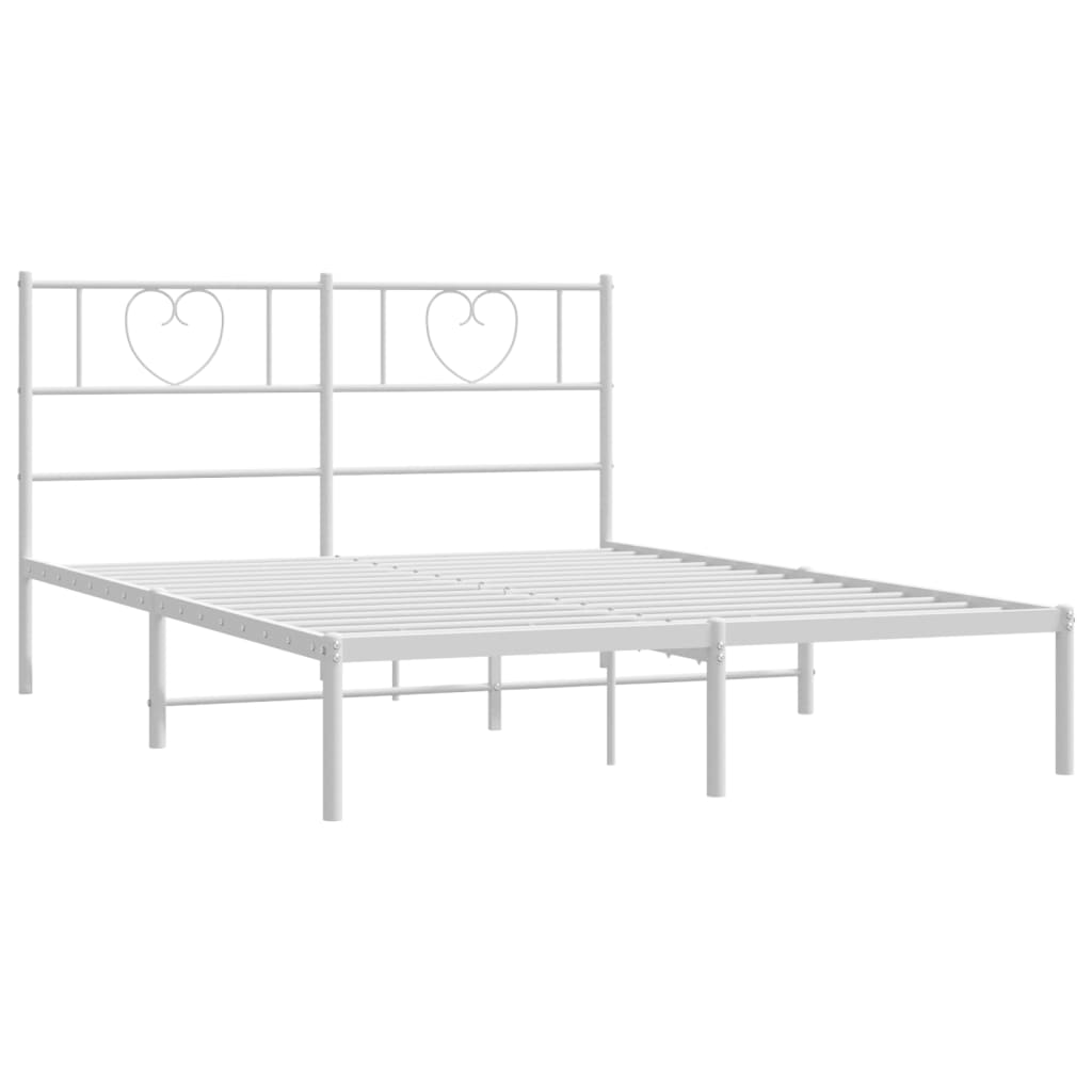 White metal bed frame with heart detail headboard