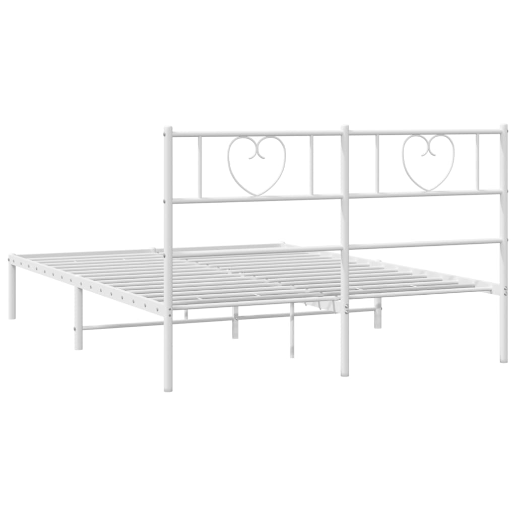 White metal bed frame with heart headboard