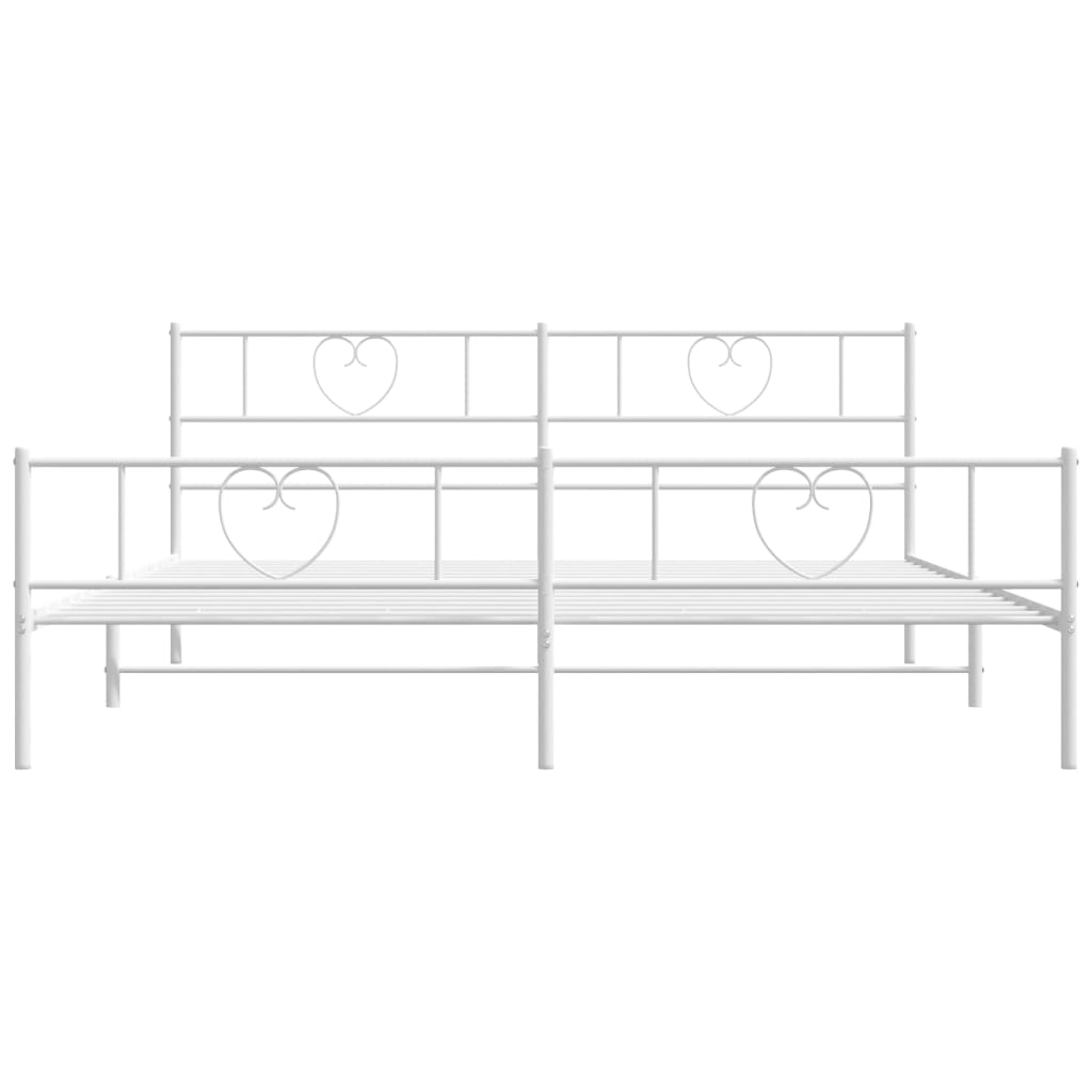 White metal bed frame with heart accents