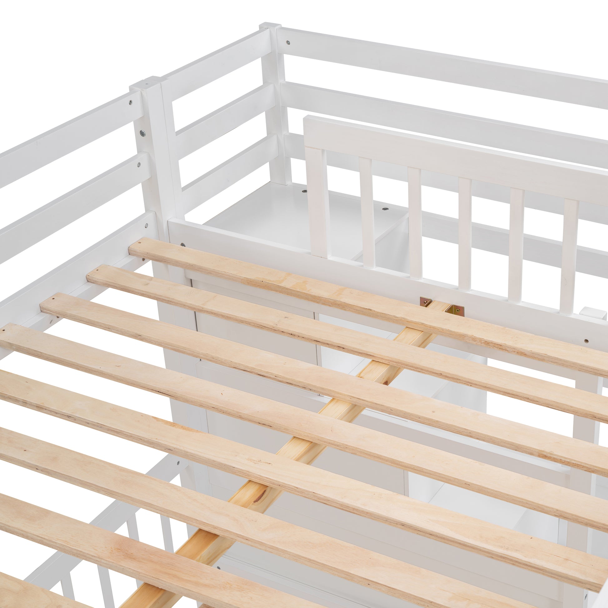 White twin bed frame with wooden slats and safety rails
