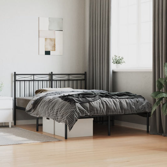 Black metal bed frame with a decorative headboard and footboard