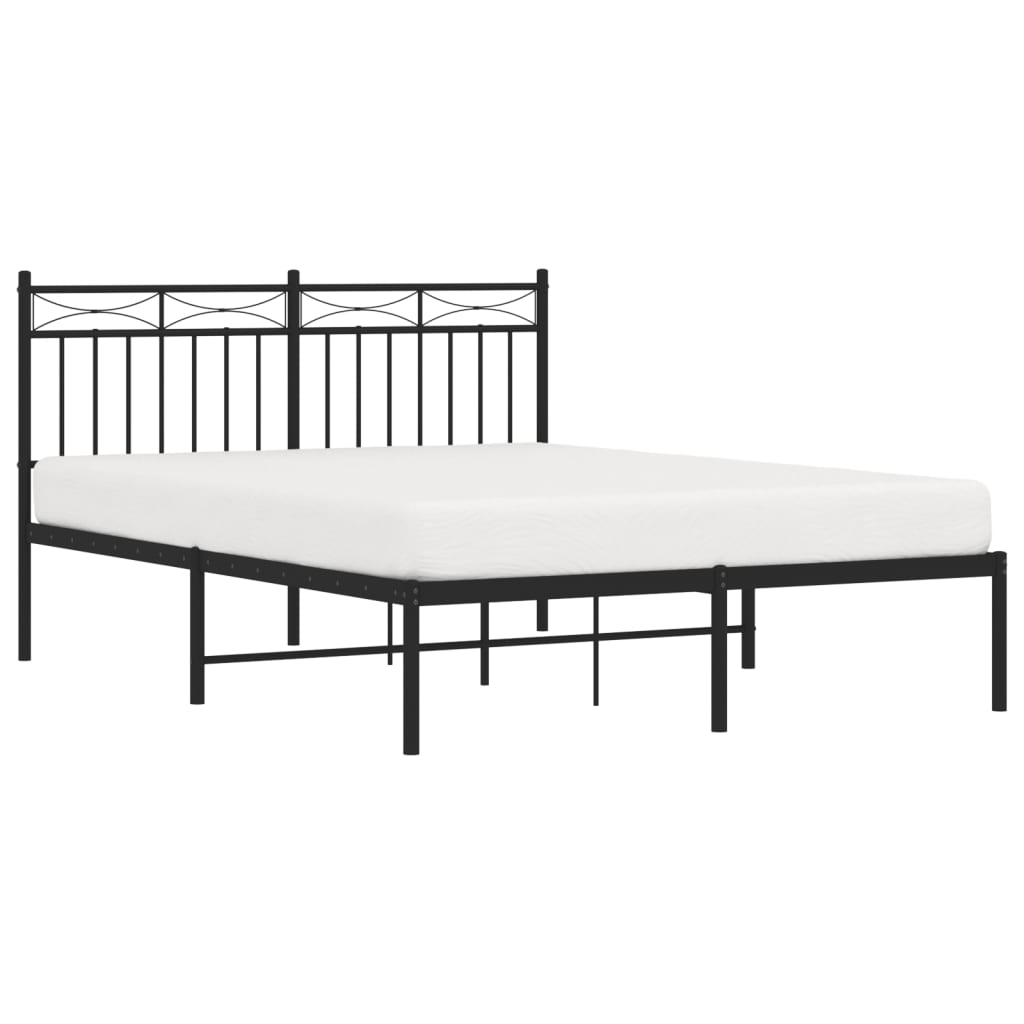 Black metal platform bed frame with decorative headboard