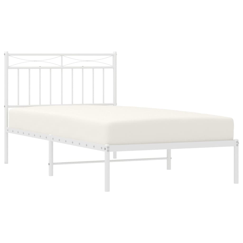 White metal bed frame with slatted headboard and mattress