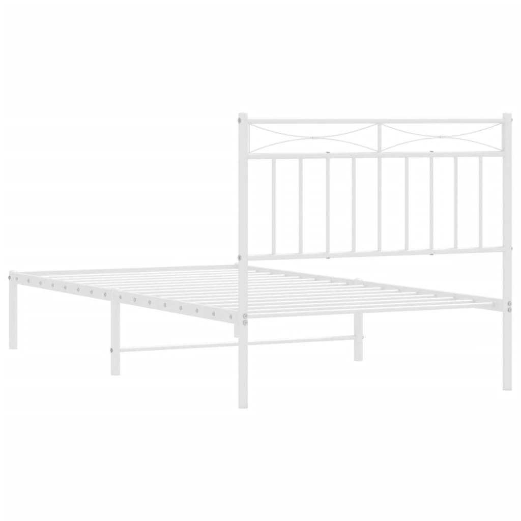 White metal bed frame with slatted base and decorative headboard