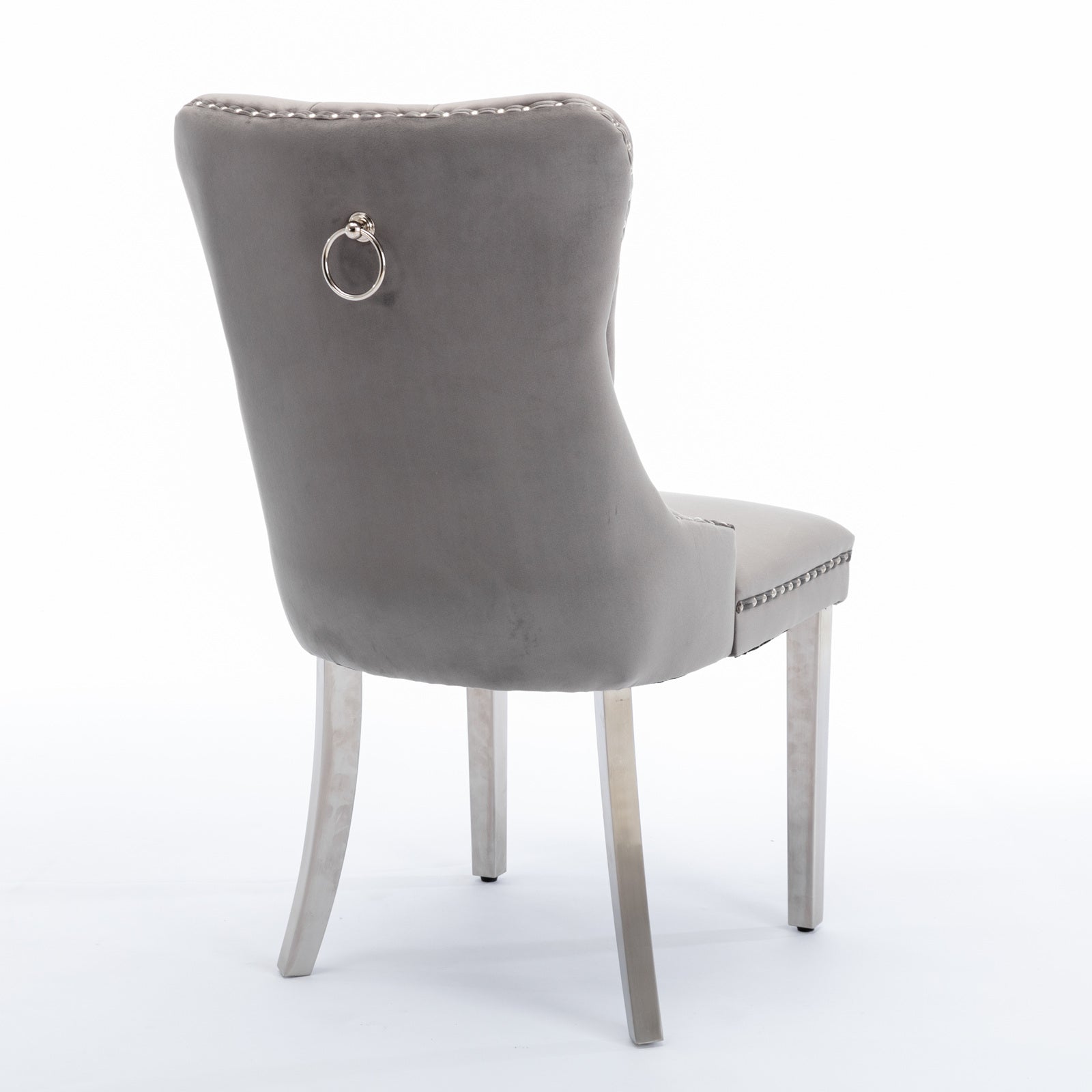 Grey velvet dining chair with silver studding and ring detail