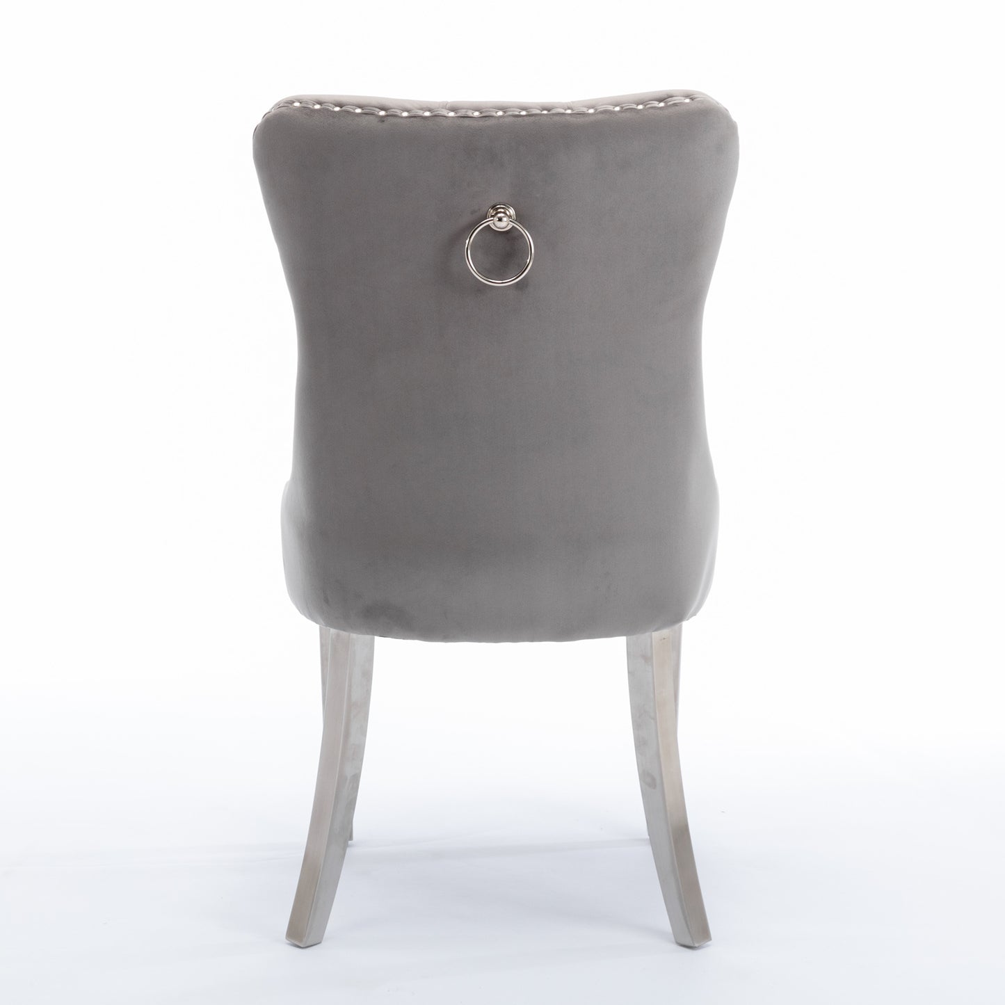 Grey velvet dining chair with silver ring pull and diamond tufting